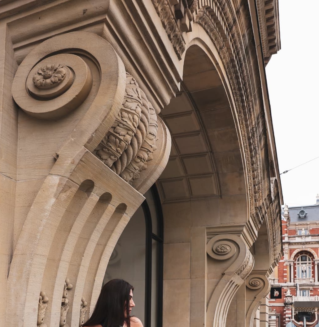 Sculpted stone archway and historic architectural details